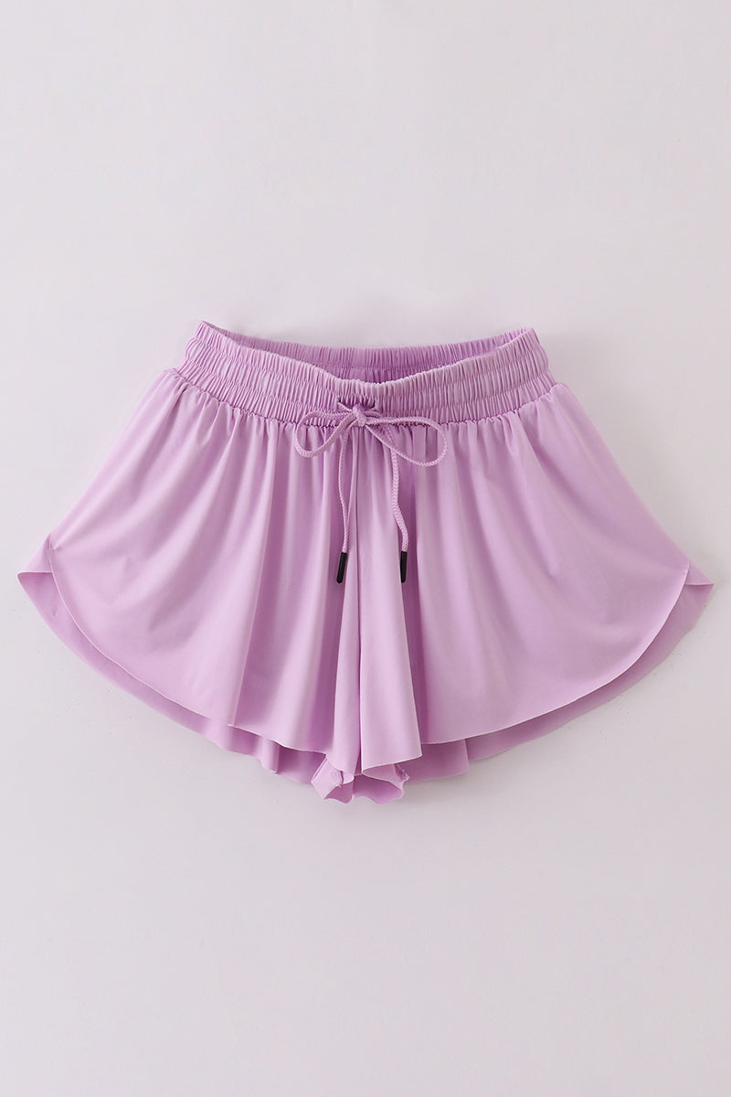 Purple woman sports shorts