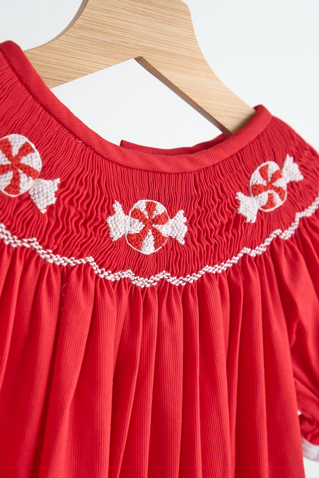 Red candy hand smocked girl romper