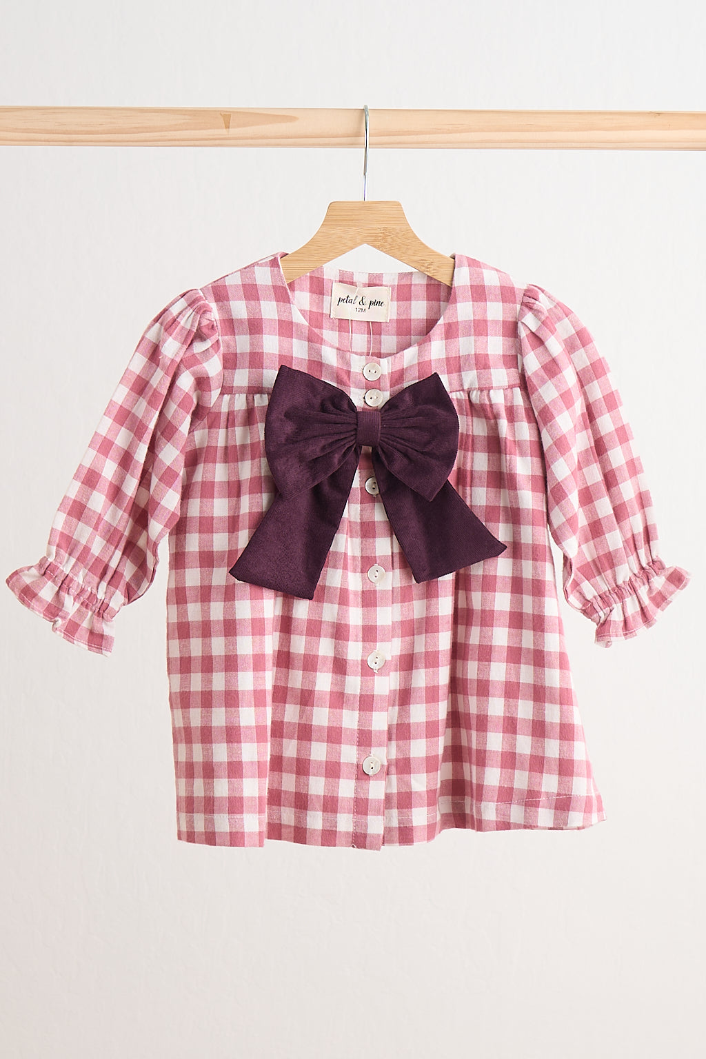 Pink gingham flannel bow dress