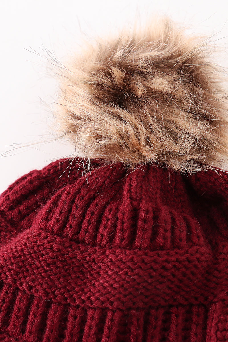 Burgundy pompom cable beanie